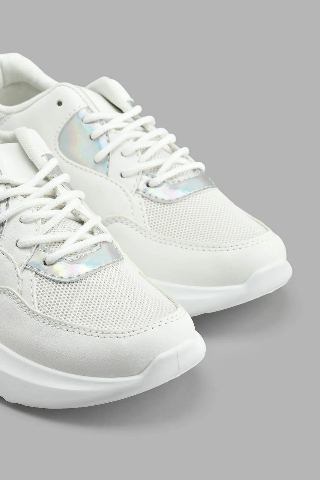 White Lace Up Sneaker With Silver Overlay